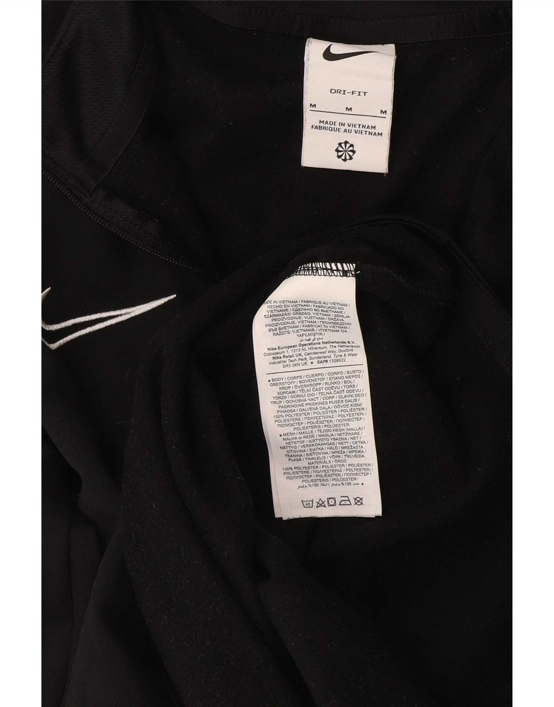 Nike Dri Fit majica s izrezom na patent i gornji dio trenirke srednje crne boje