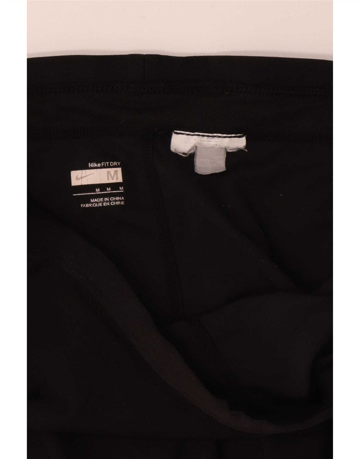Nike ženske Capri trenirke UK 12 srednje crne