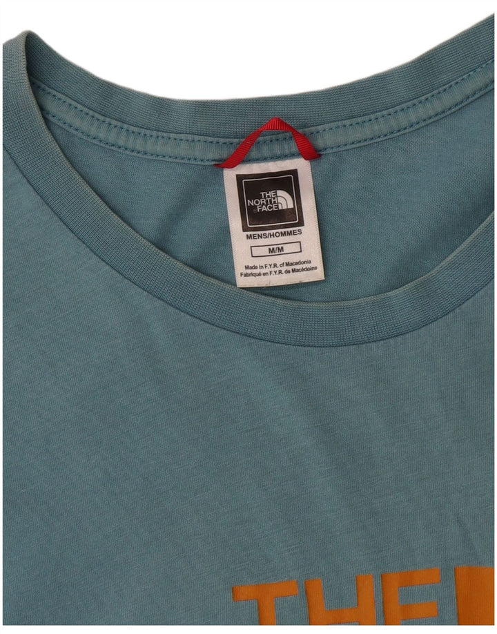 Srednje plava muška majica s grafičkim motivima The North Face