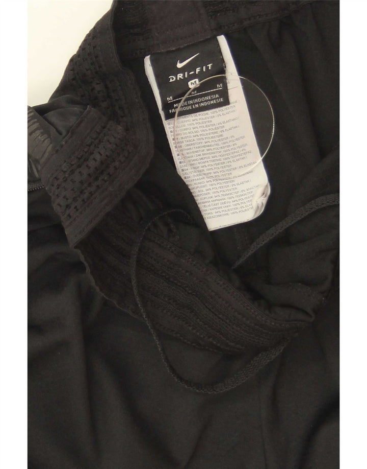 Ženske hlače za trenirku Nike Dri Fit UK 12 Srednji crni poliester