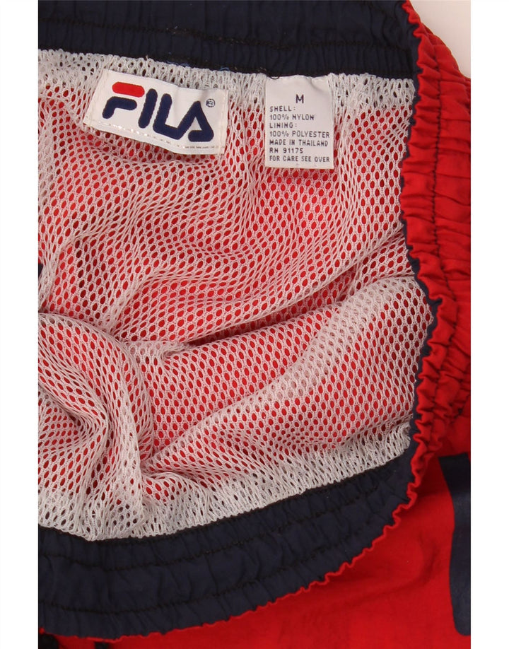 Fila muške grafičke sportske kratke hlače srednje crvene boje od najlona