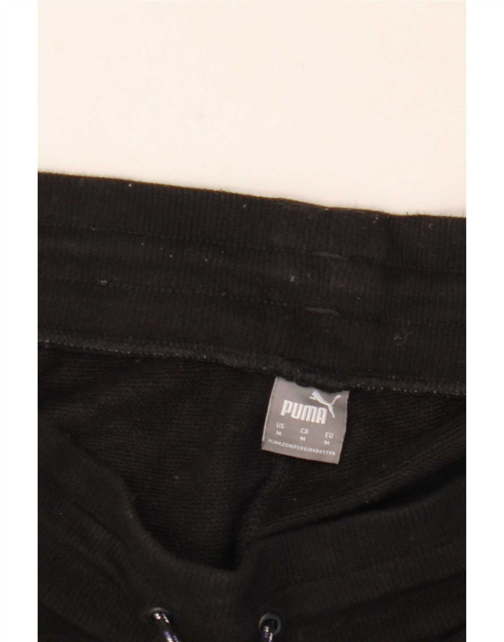 Puma muške trenirke Hlače Joggers Srednje crni životinjski print
