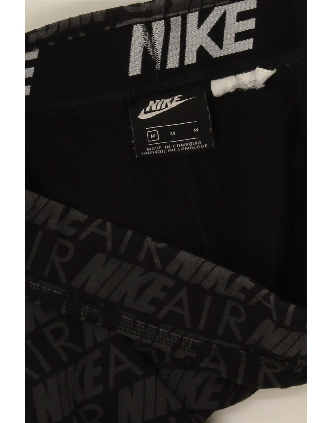 Nike ženske grafičke tajice UK 12 srednje sive