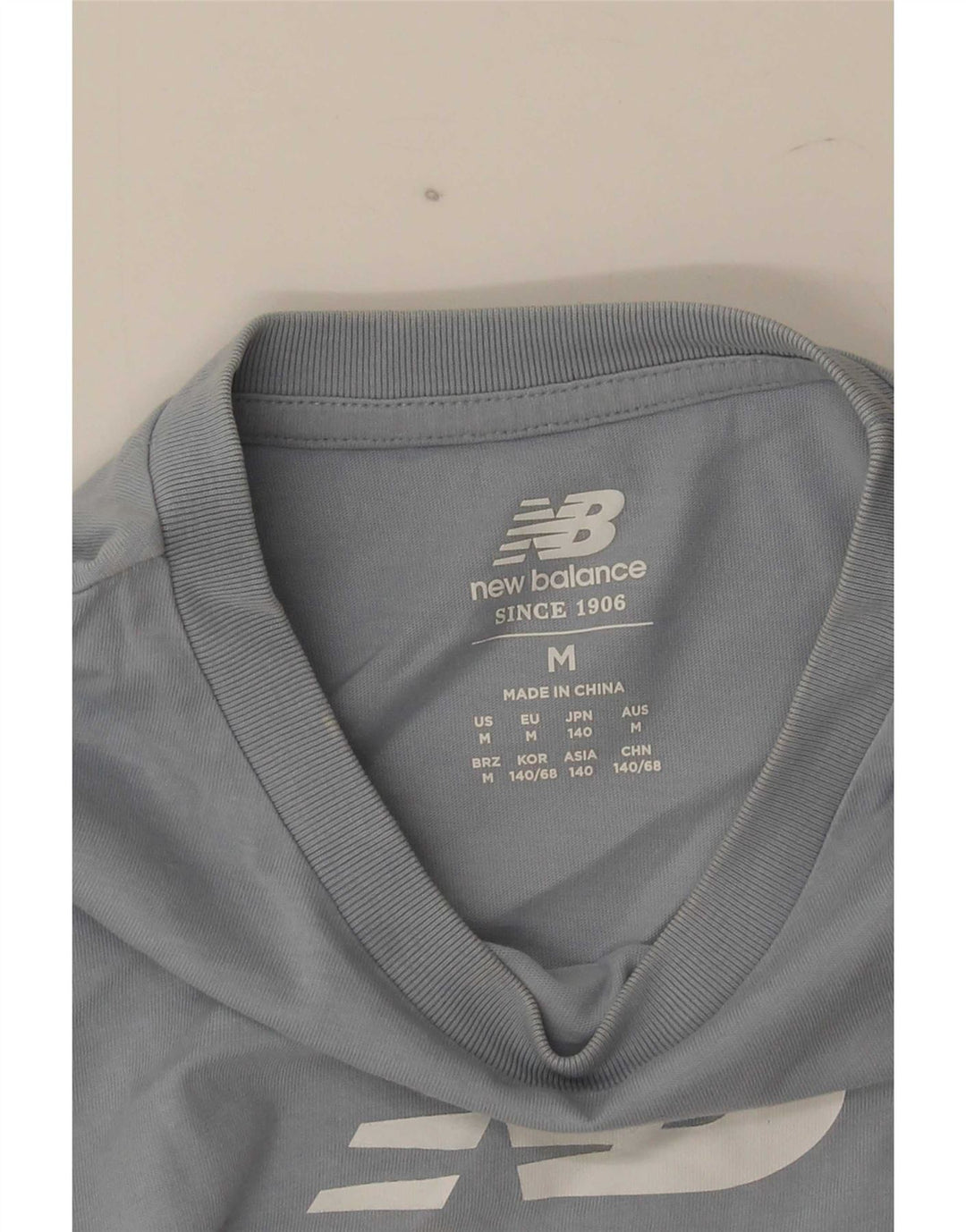 New Balance majica s grafičkim motivima za dječake 9-10 godina srednje plava