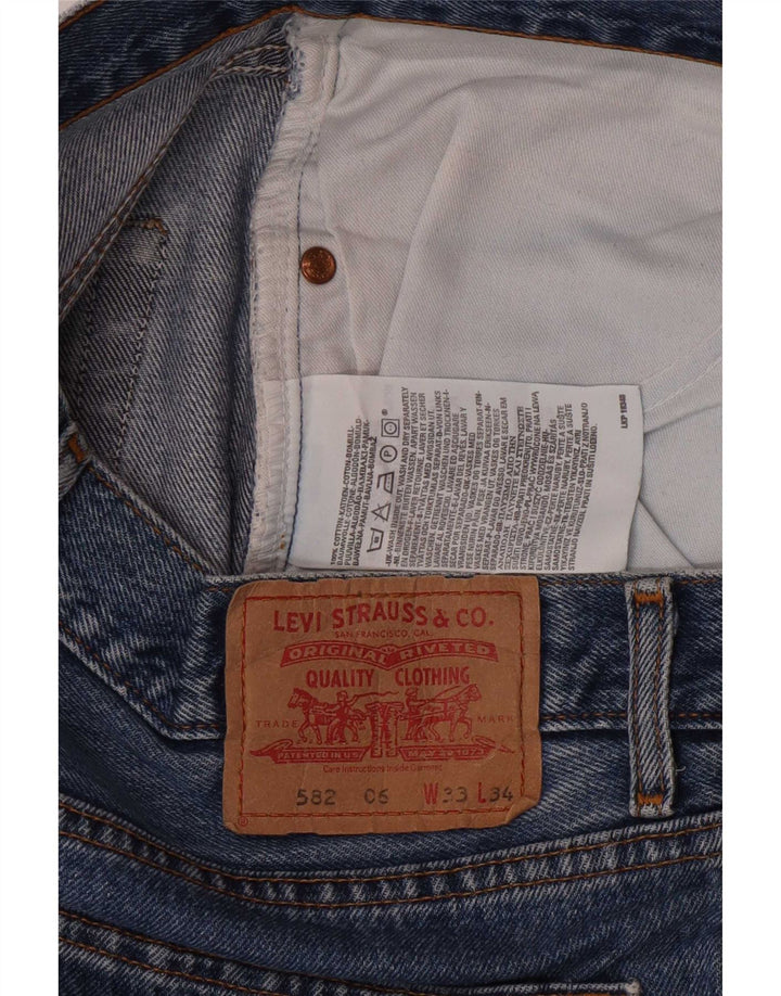 Levi's muške 582 ravne traperice W33 L28 plavi pamuk