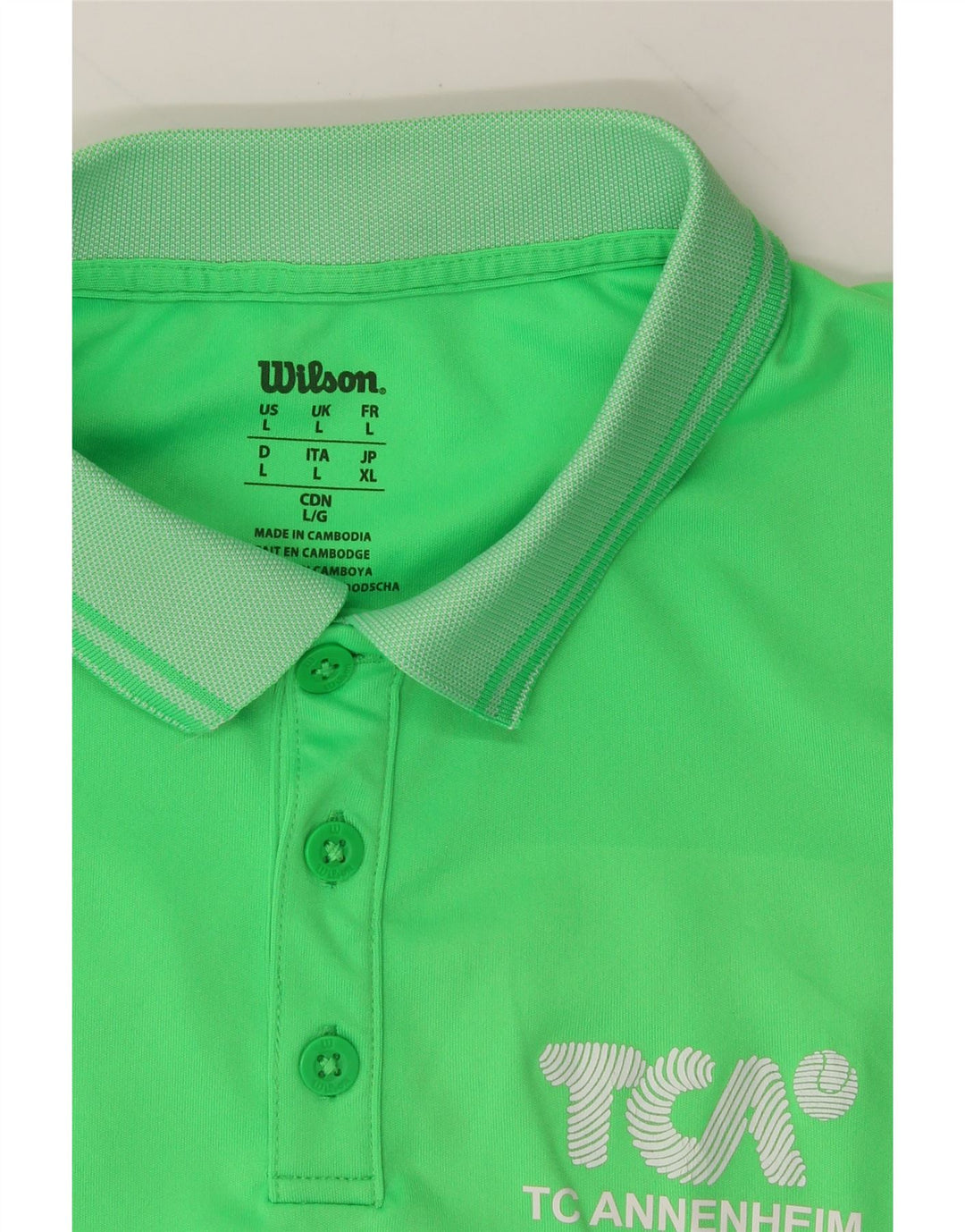 WILSON Mens Graphic Polo Shirt Large Green Polyester Vintage Wilson and Second-Hand Wilson from Messina Hembry 