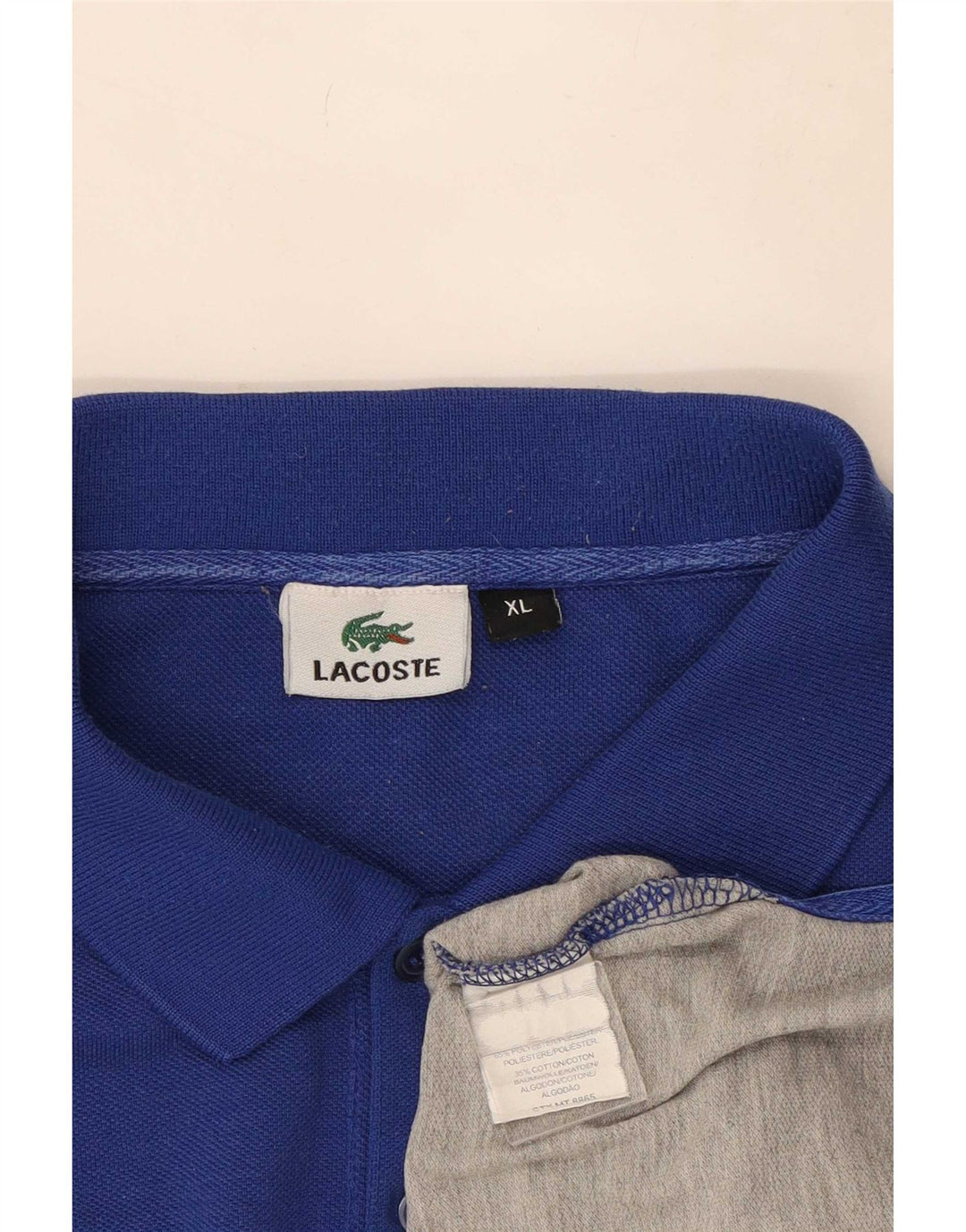 Lacoste muška polo majica XL raznobojni prugasti poliester