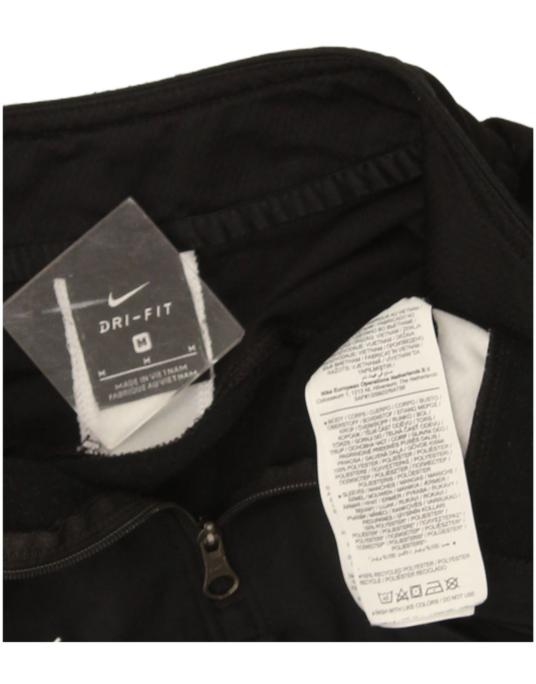 Nike Dri Fit majica s izrezom na patent i gornji dio trenirke srednje crne boje
