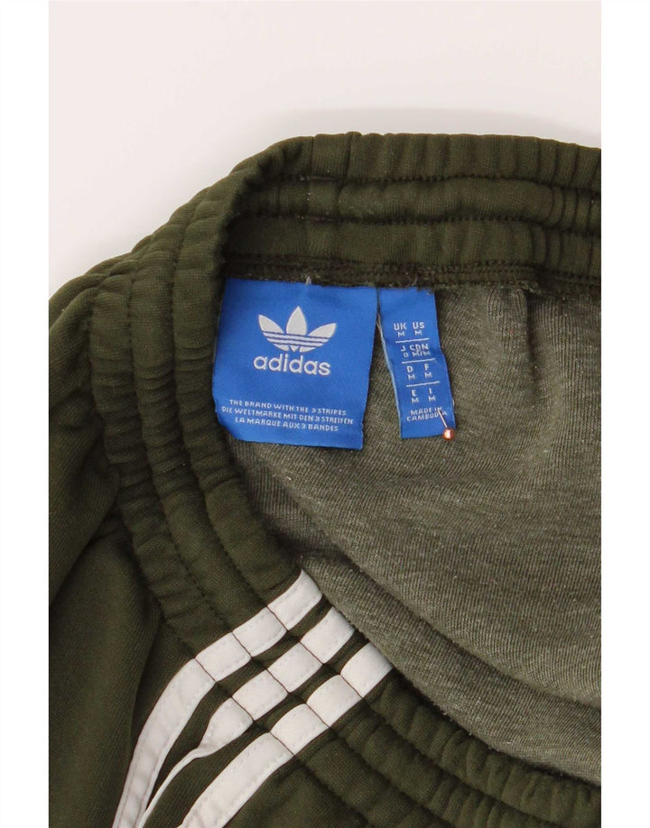 Adidas muške trenirke Hlače Joggers srednje zelene boje od poliestera