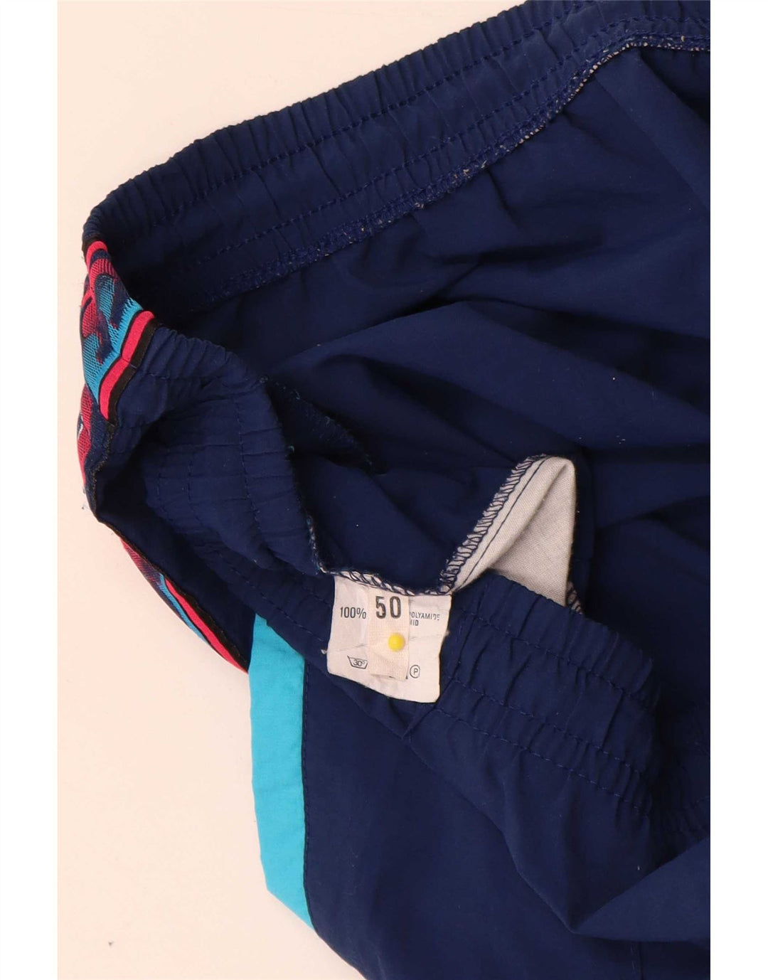 Asics muške grafičke trenirke Hlače IT 50 Medium Navy Blue Colourblock