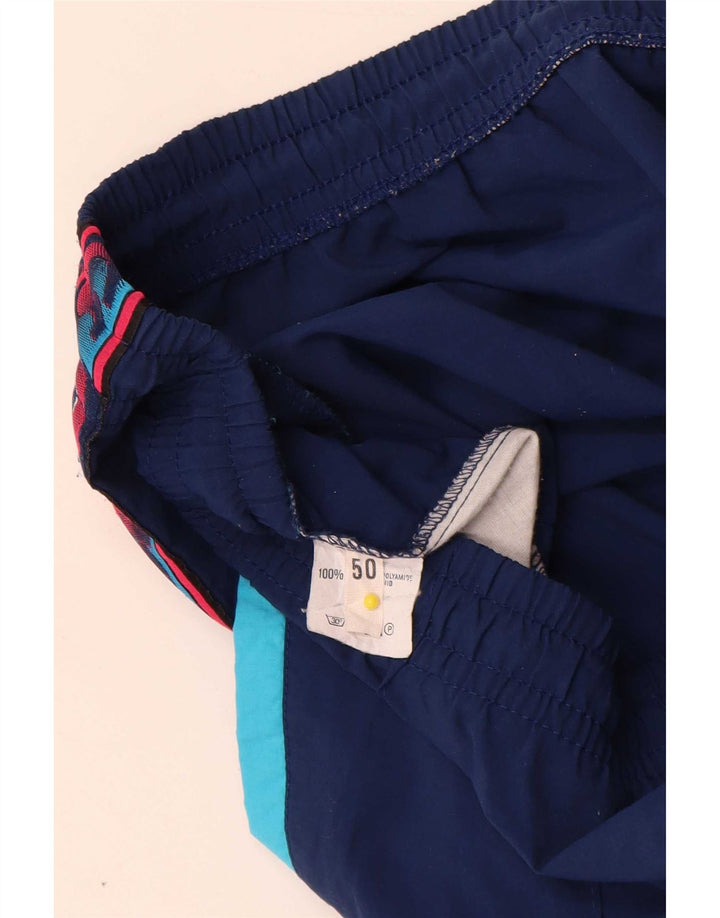 Asics muške grafičke trenirke Hlače IT 50 Medium Navy Blue Colourblock