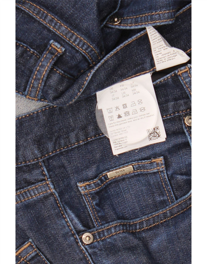 HUGO BOSS Muške uske traperice W34 L34 tamnoplavi pamuk