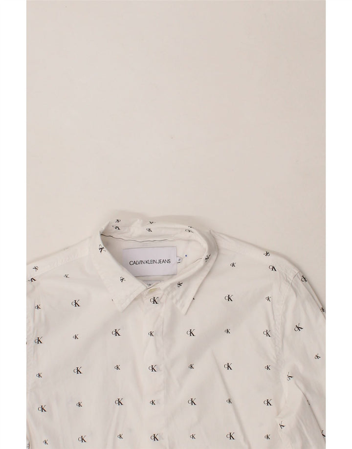 CALVIN KLEIN JEANS Mens Graphic Shirt Small White Cotton Vintage Calvin Klein Jeans and Second-Hand Calvin Klein Jeans from Messina Hembry 