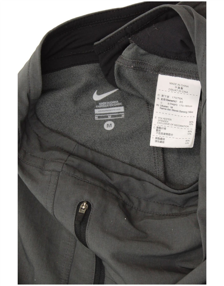 NIKE muške hlače za trenirku srednje sive boje od poliestera