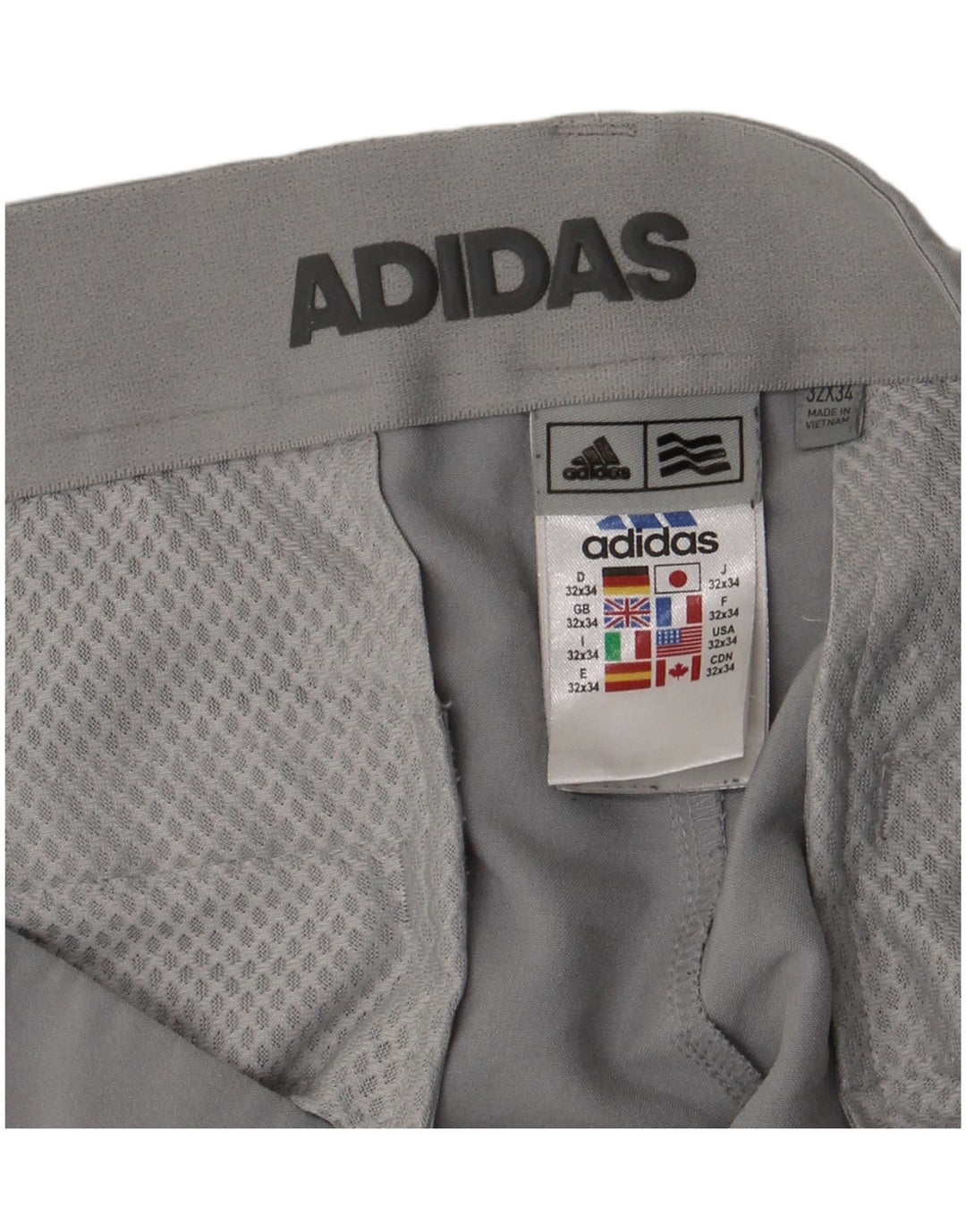 Adidas ženske uske chino hlače W32 L34 sivi poliester