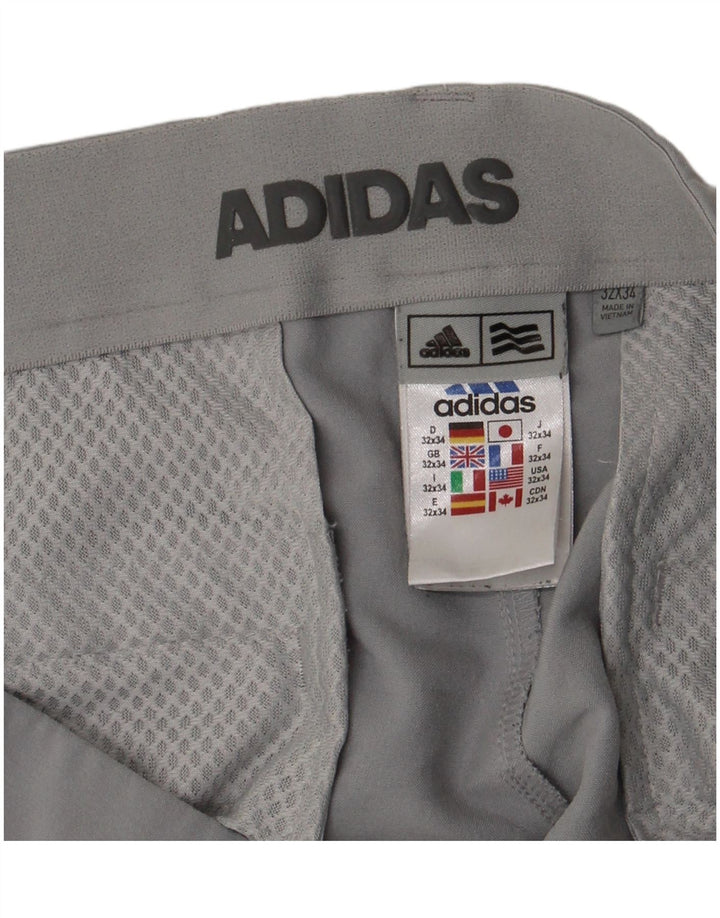 Adidas ženske uske chino hlače W32 L34 sivi poliester