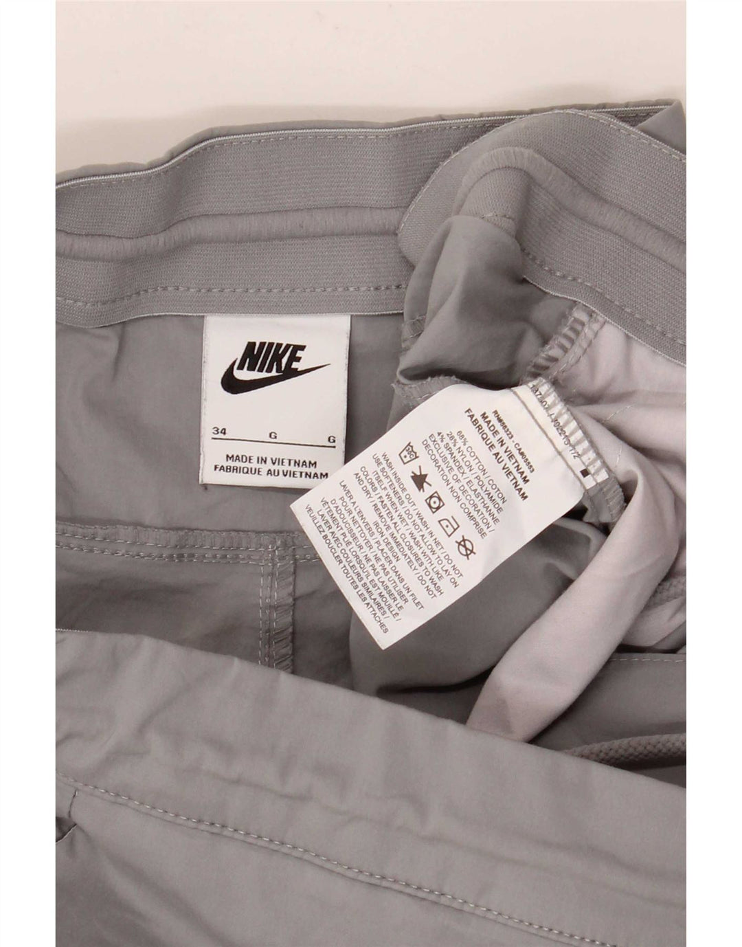Nike muške ravne kargo hlače W34 L28 sivi pamuk