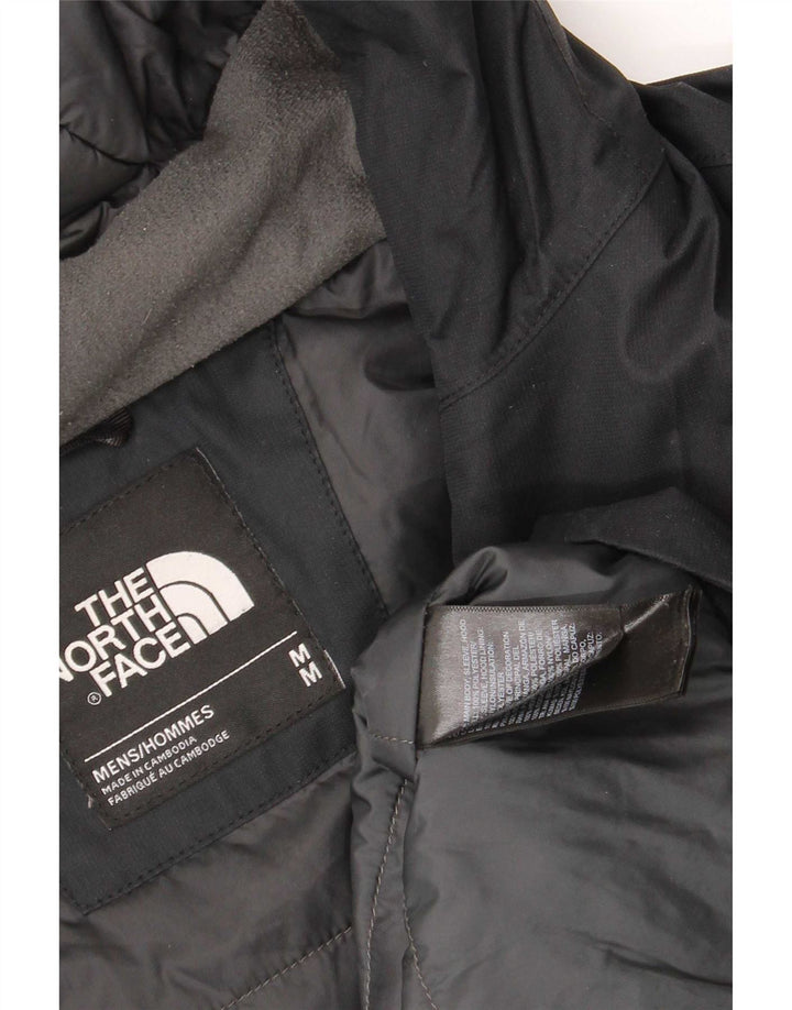 The North Face muška vjetrovka s kapuljačom UK 38 srednji crni poliester