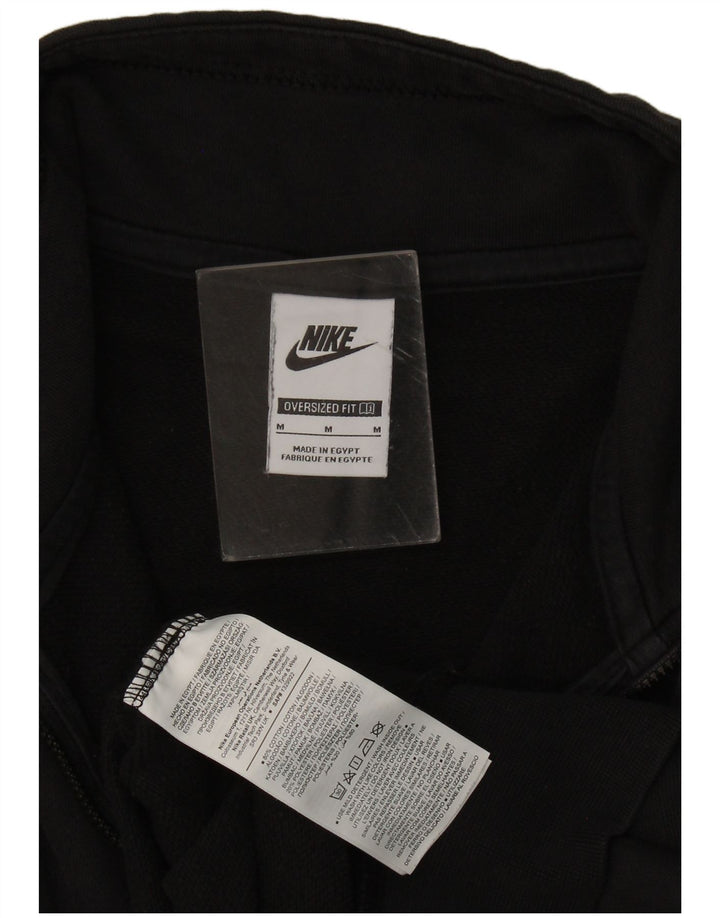 Nike ženska majica s prekomjernim grafičkim zip izrezom UK 14 srednje crna