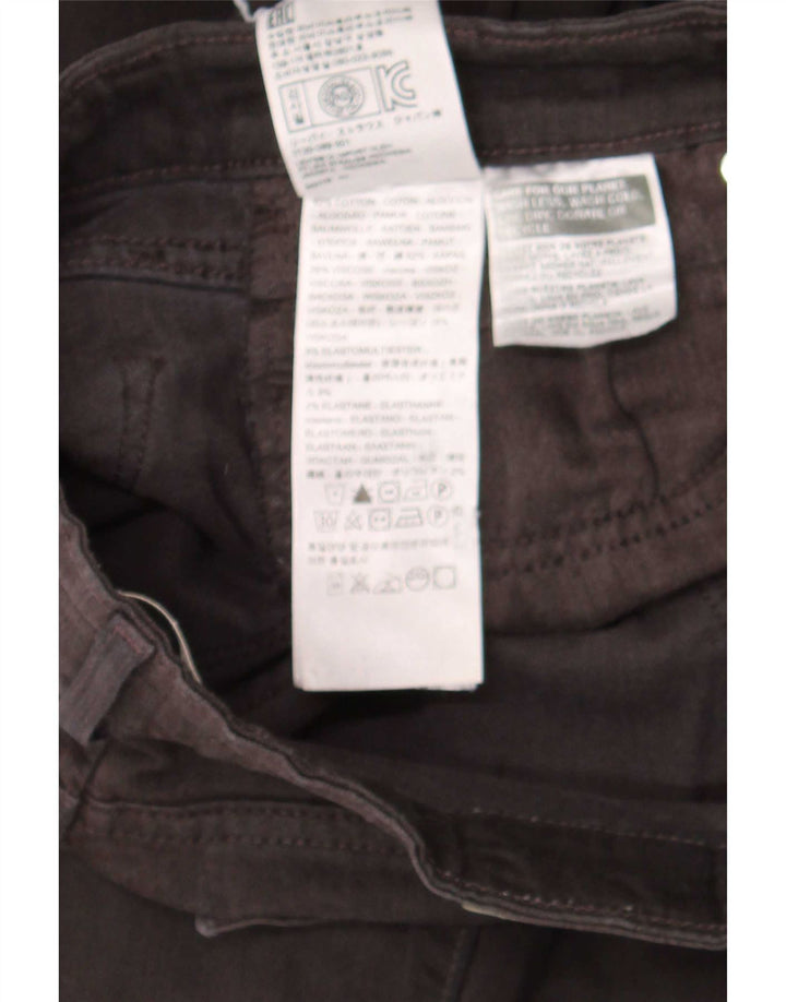 Levi's ženske 712 uske traperice W26 L30 crni pamuk