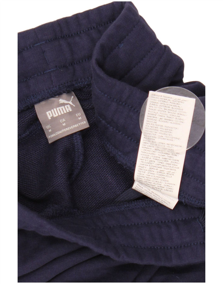 PUMA Ženska trenirka Hlače Joggers UK 14 Srednje tamnoplavi pamuk
