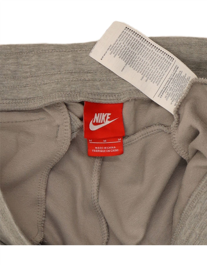 Nike muške trenirke Hlače Joggers srednje sive boje, pamuk