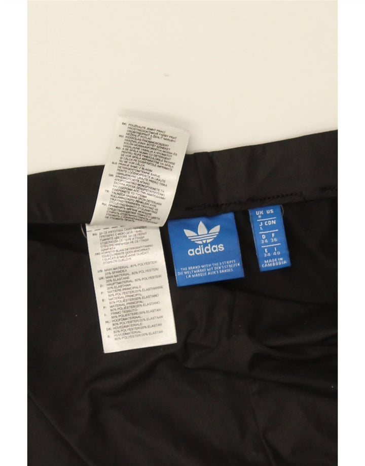 ADIDAS ženske tajice UK 8 male crne poliesterske