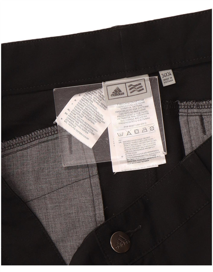 Adidas muške uske chino hlače W34 L34 crni poliester