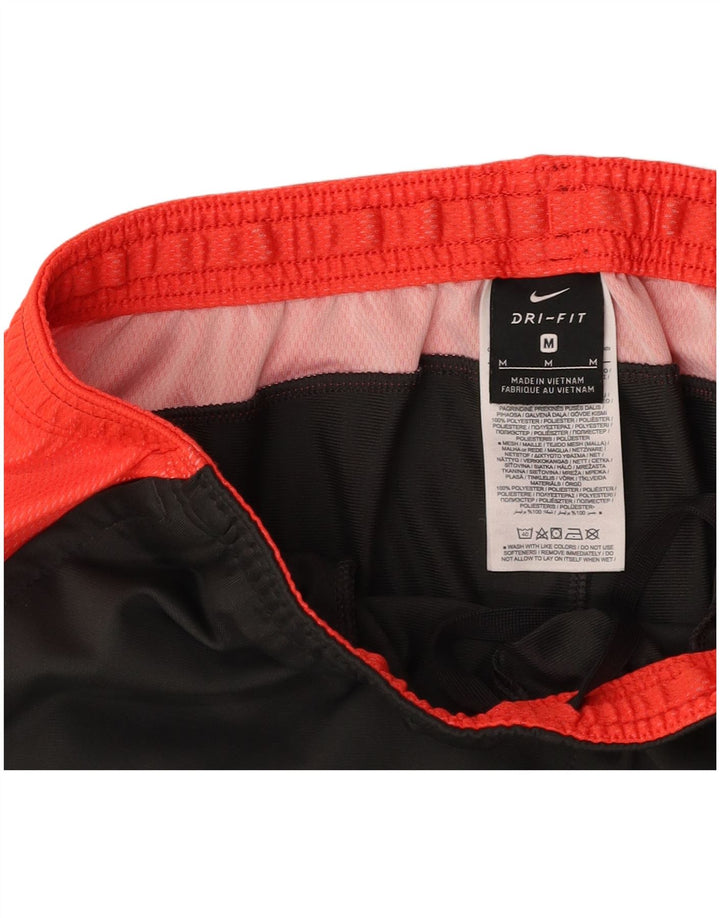 NIKE muške hlače za trenirku Dri Fit srednje sive boje od poliestera