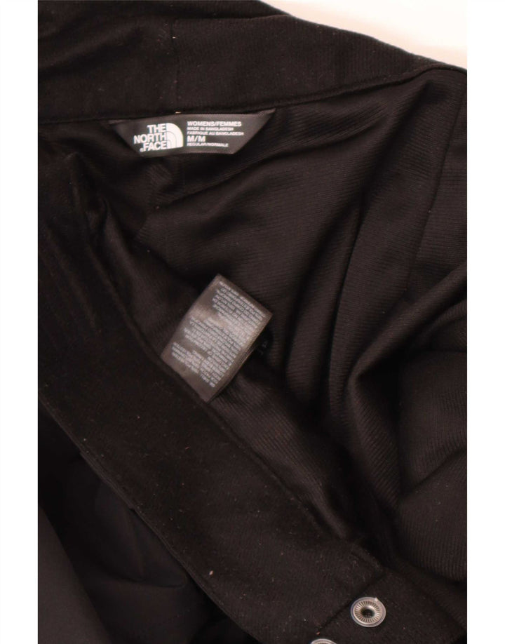 The North Face ženske hlače vjetrovke srednjeg kroja W28 L32 crne