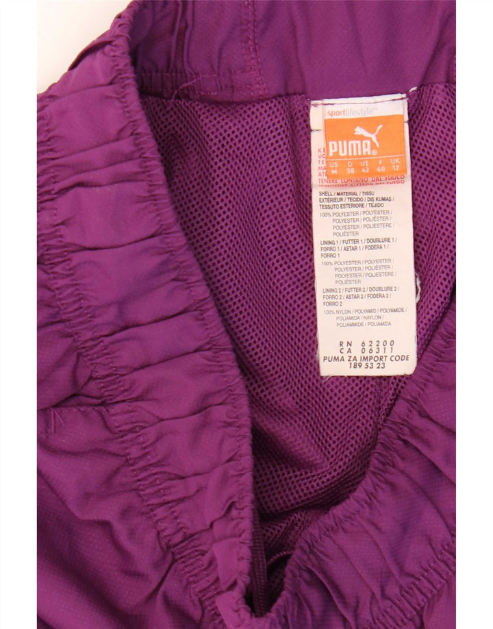Puma ženske hlače za trenirku UK 12 Medium Purple Colourblock Poliester