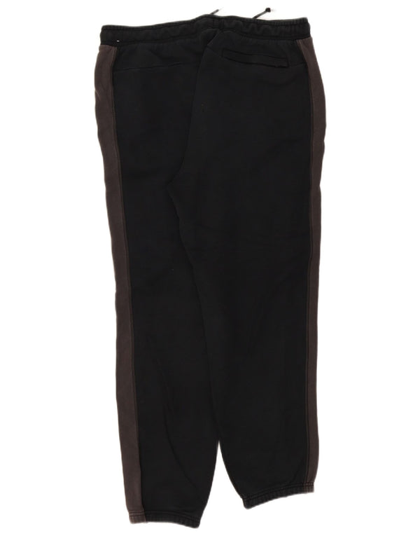 Nike muške grafičke trenirke hlače joggers XL crne boje