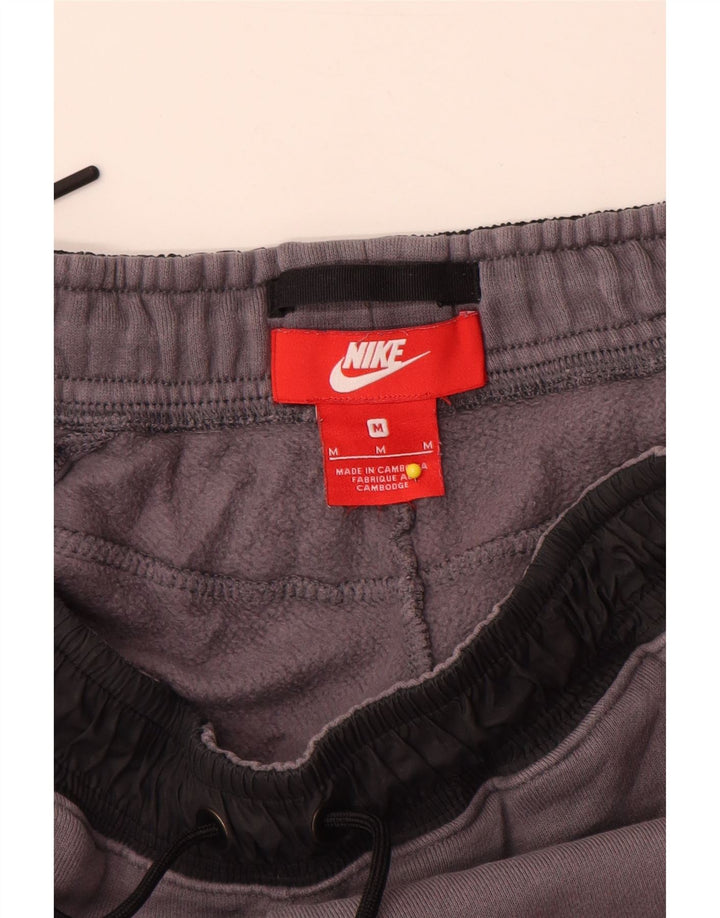 Nike muške trenirke Hlače Joggers srednje sive boje, pamuk