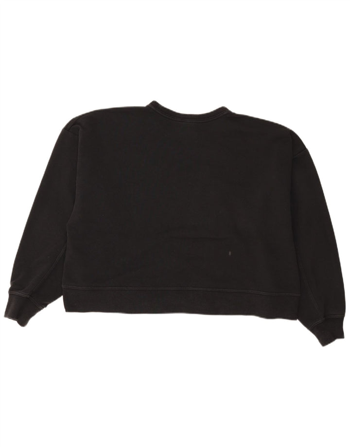 Nike Ženska skraćena kratka kratka majica s prekomjernom majicom UK 16 Large Black