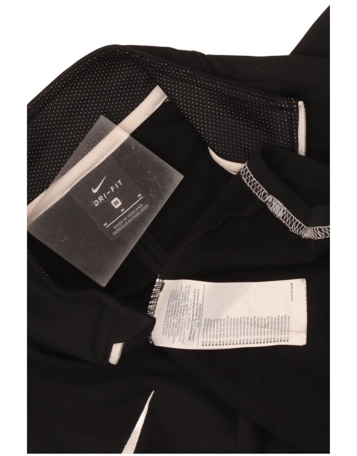 Nike Dri Fit majica s izrezom na patent i gornji dio trenirke srednje crne boje