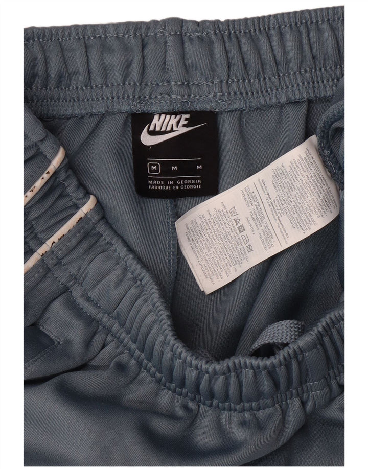 NIKE Mens Tracksuit Trousers Joggers Medium  Blue Polyester