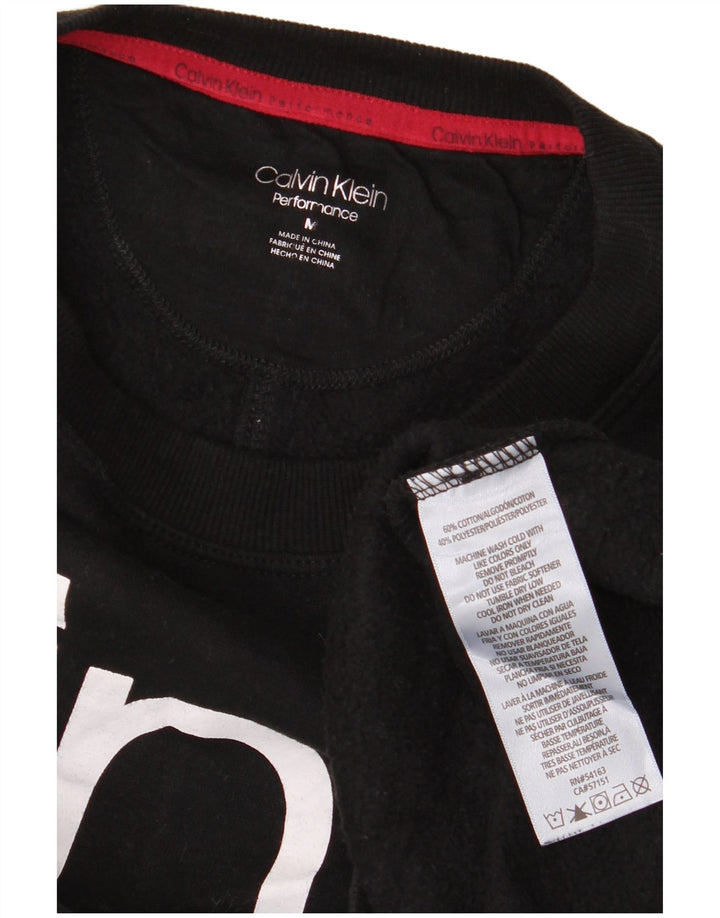 Calvin Klein Ženska prekomjerna trenirka s grafičkim motivima UK 14 srednje crna