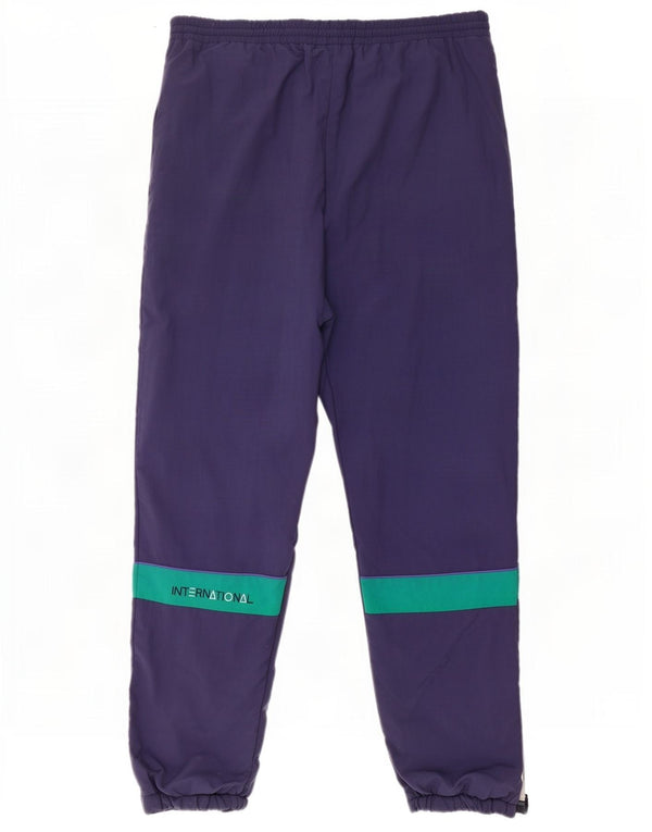 Puma muške trenirke Hlače Joggers Large Navy Blue Colourblock Najlon
