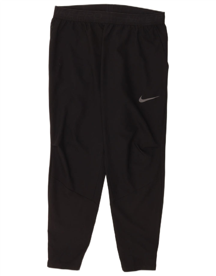 Velike crne hlače od poliestera Nike Dri Fit Graphic Trenirka