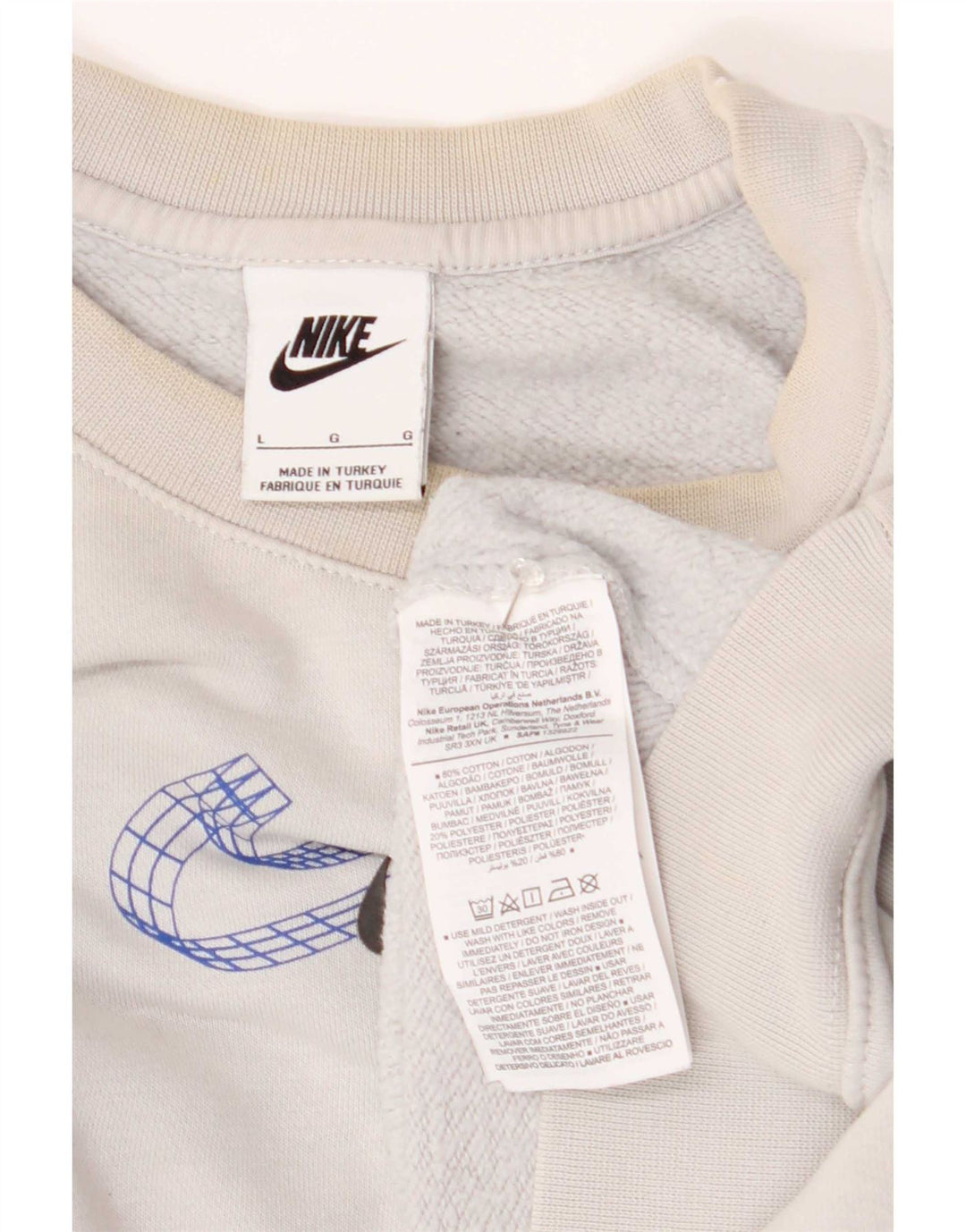 Veliki bijeli pamučni džemper Nike Graphic Sweatshirt