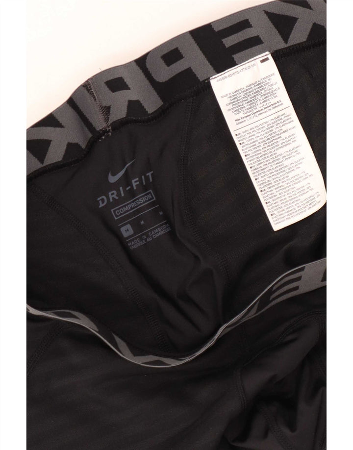 Nike muške Dri Fit grafičke tajice srednje crne pruge od poliestera