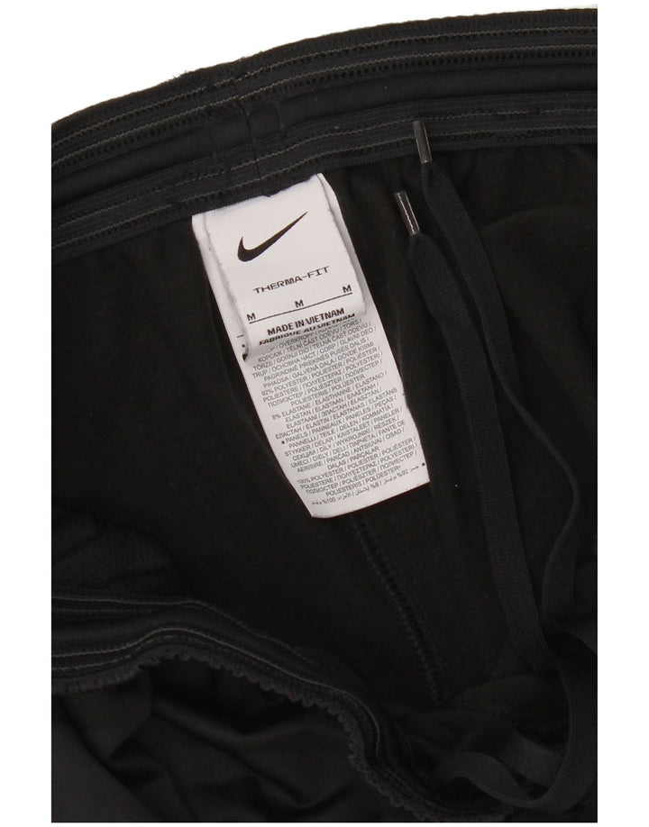Nike muške hlače za trenirku Therma-Fit srednje crne boje od poliestera