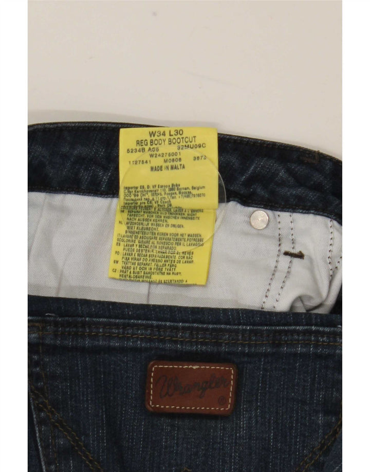 Ženske traperice Wrangler Bootcut W34 L30 tamnoplavi pamuk