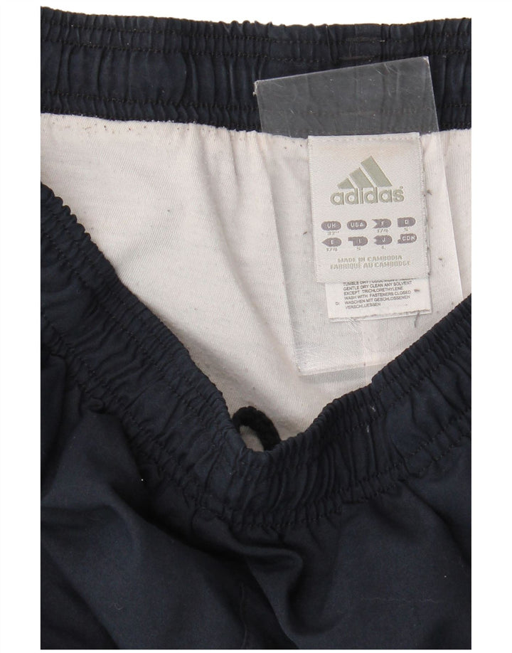 Adidas muške trenirke Hlače Joggers Medium tamnoplavi poliester