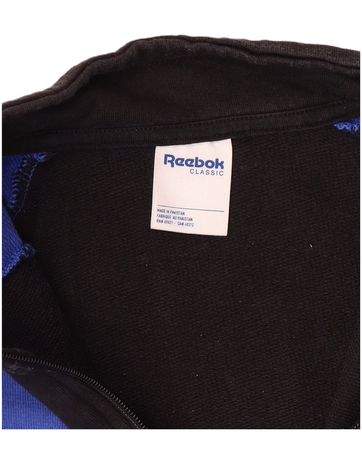 Reebok muška trenirka s 1/4 patentnim zatvaračem srednje plavi pamuk