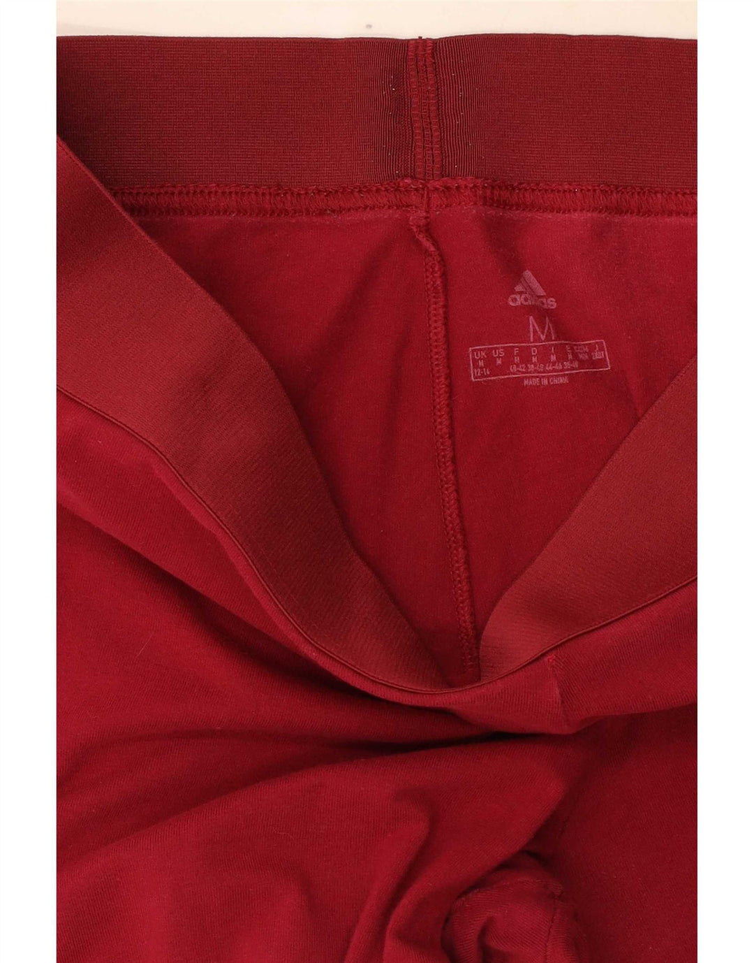Adidas ženske tajice UK 12/14 srednje crvene pamuk