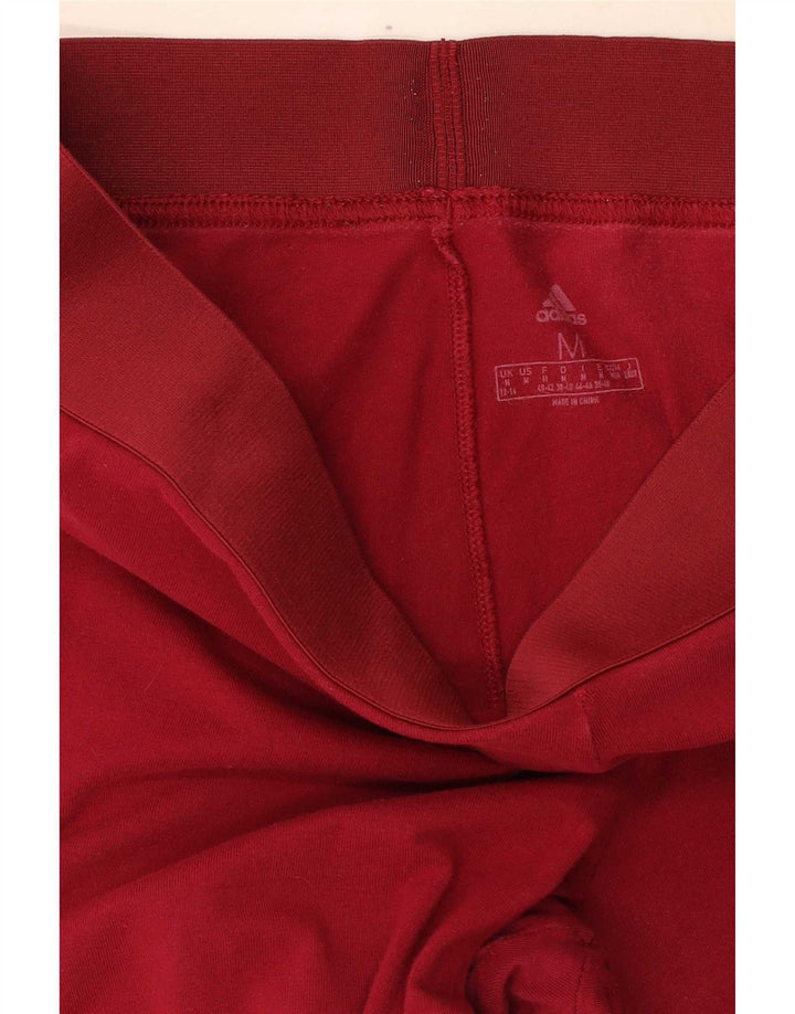 Adidas ženske tajice UK 12/14 srednje crvene pamuk