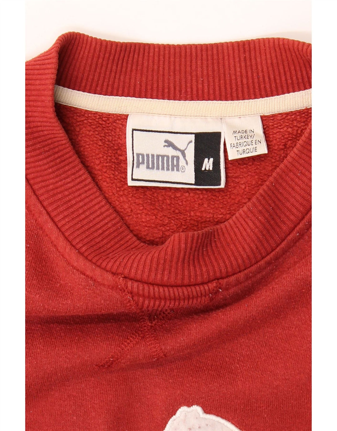 PUMA muški džemper srednje crvene boje s grafičkim motivima