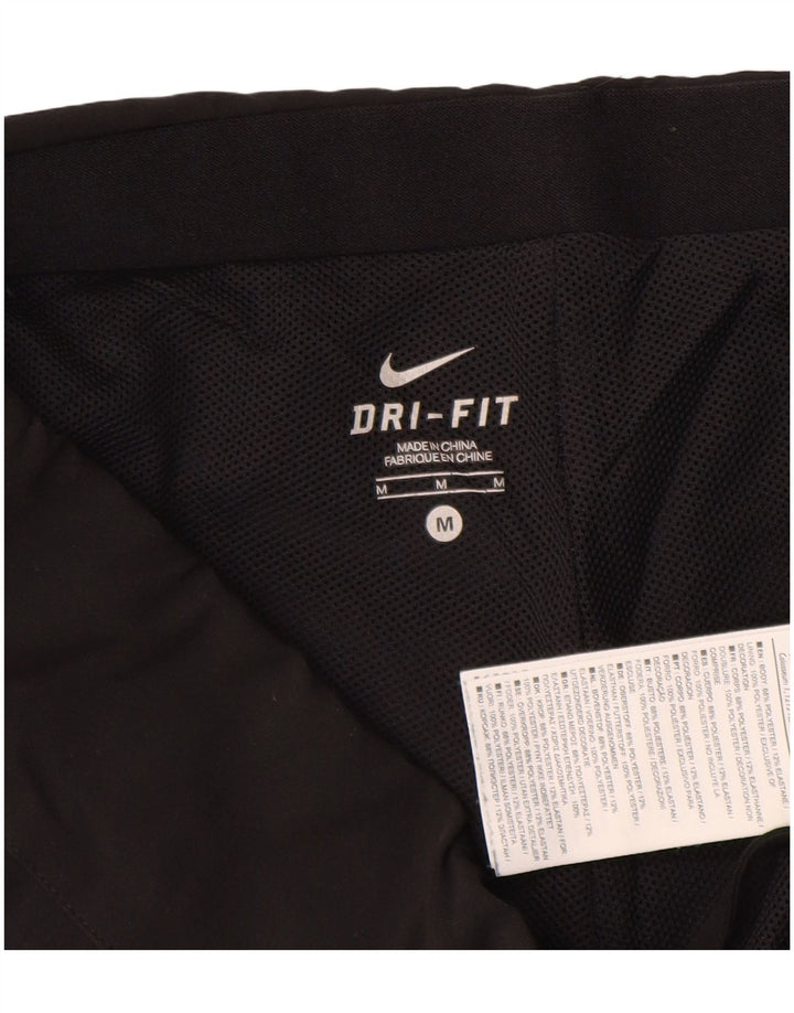 Ženske hlače za trenirku Nike Dri Fit UK 14 Srednji crni poliester