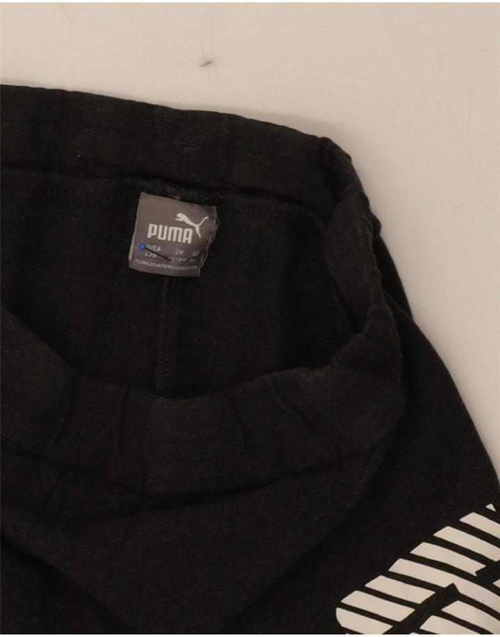 PUMA Girls Graphic Leggings 11-12 Years  Black Vintage Puma and Second-Hand Puma from Messina Hembry 